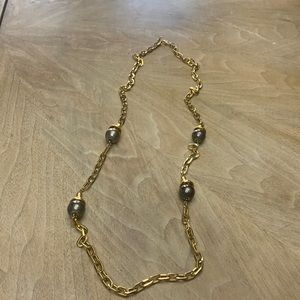 Long gold toned fashion necklace